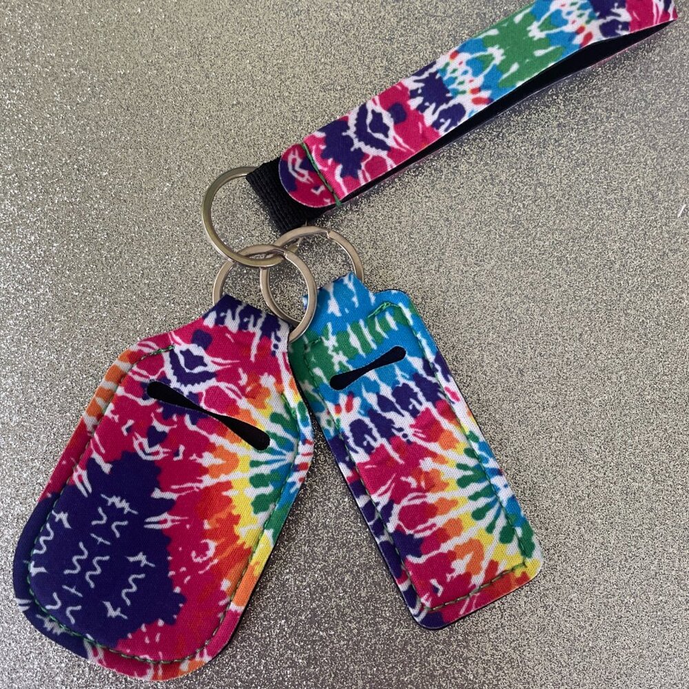 NWOT 3 Piece Neoprene Wristlet, Sanitizer and Lip Balm Holder Keychain Set